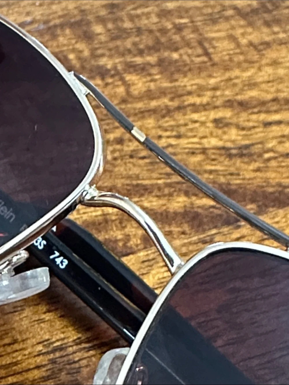 Gold toned sunglasses